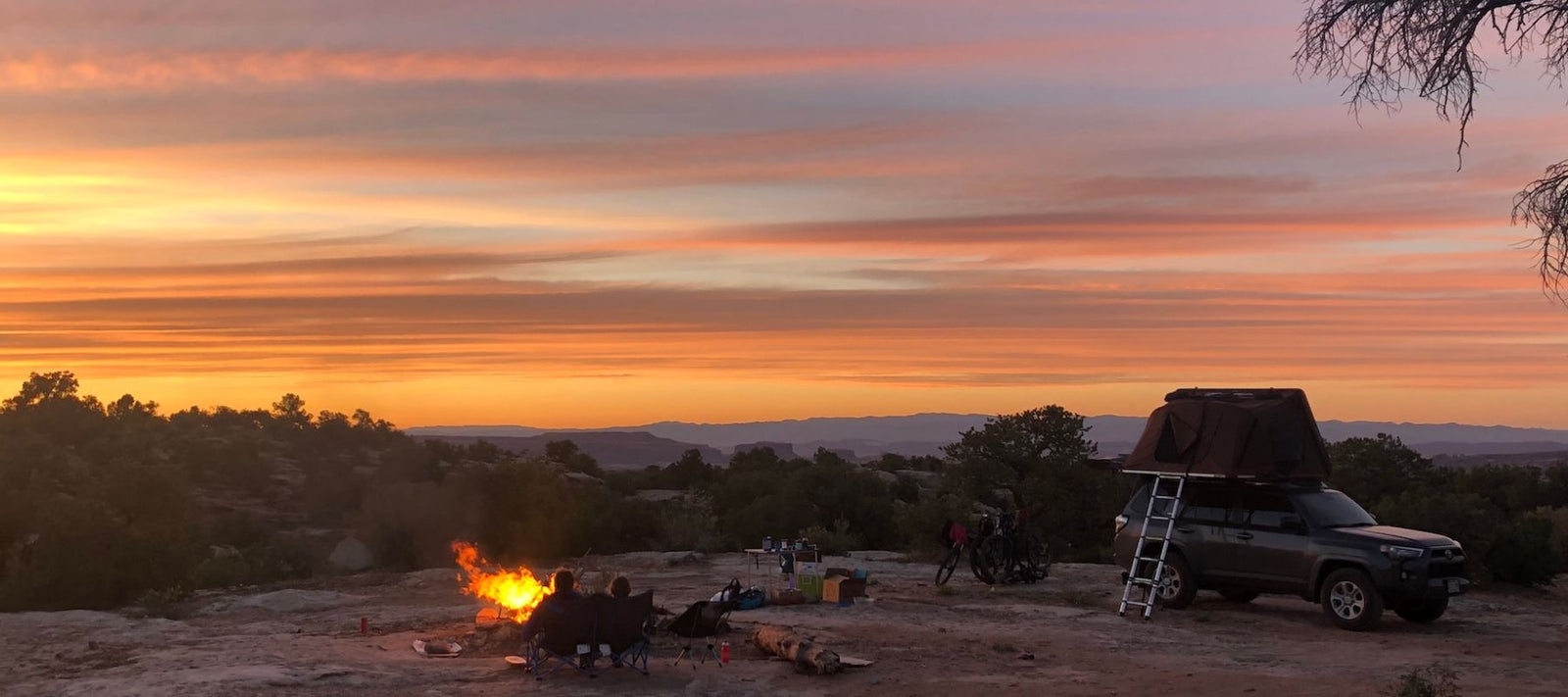 2019 toyota 4runner with rooftop tent overlooking sunset 